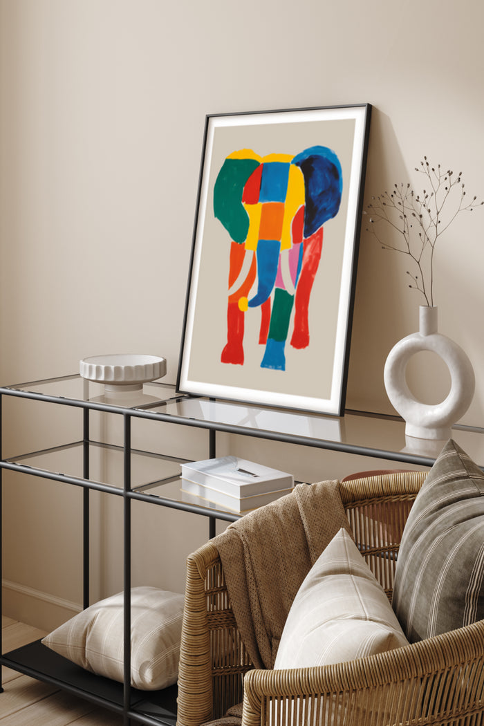 Modern abstract colorful elephant artwork in a stylish frame displayed in a home interior