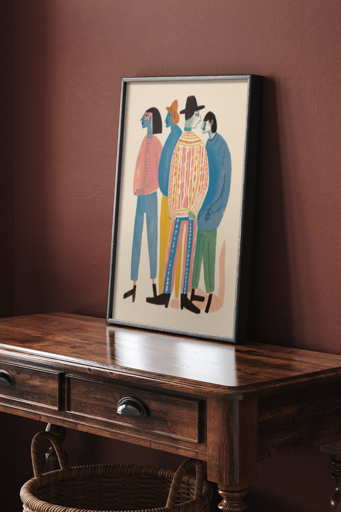 Abstract figurative poster artwork featuring colorful characters in a wooden frame displayed on a console table