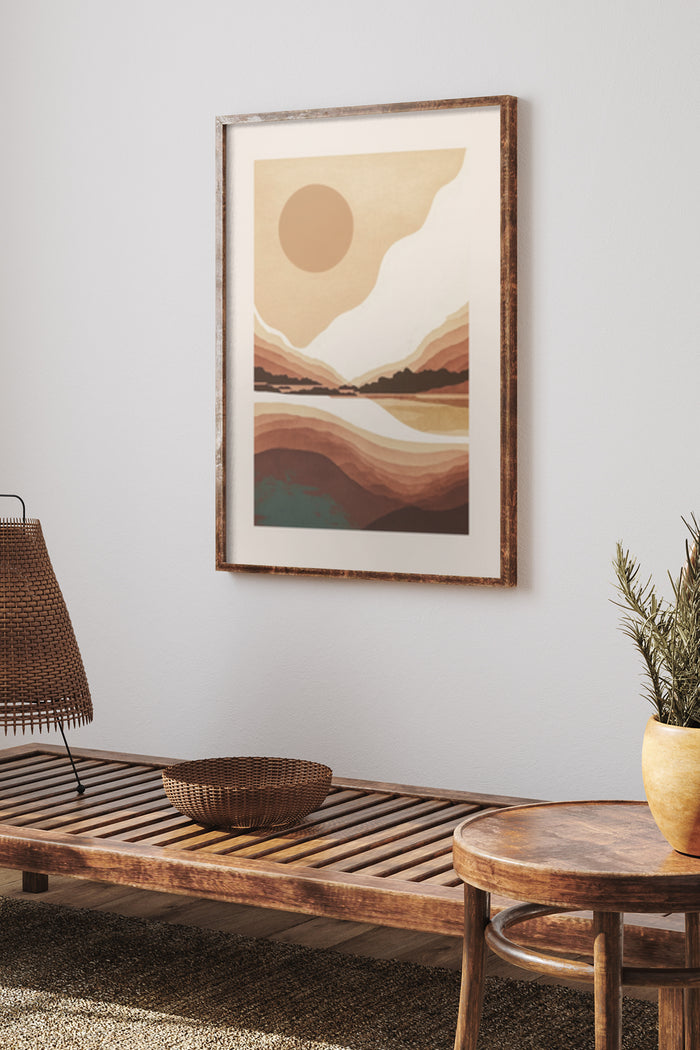 Abstract landscape art poster with sun, flowing hills, and lake in a modern home interior