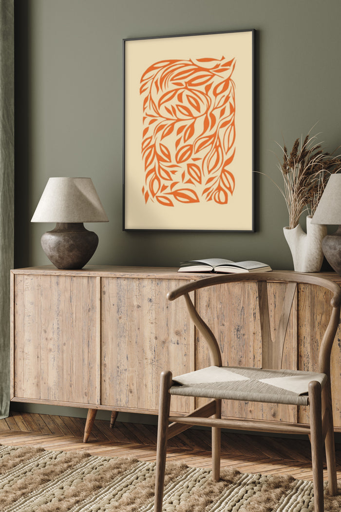 Contemporary abstract leaf artwork poster framed on a wall above wooden sideboard in stylish room