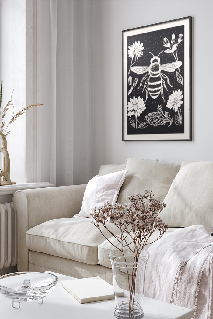 Modern black and white bee and flowers artwork in a stylish living room setting