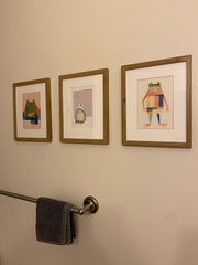 Looking very spiffy with another frog from this shop and toad from another shop. Shown here is a 5x7 matted inside an 8x10 frame. Shipping was very fast!