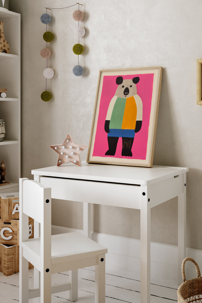 Abstract colorful panda poster on wall above white children's desk and chair