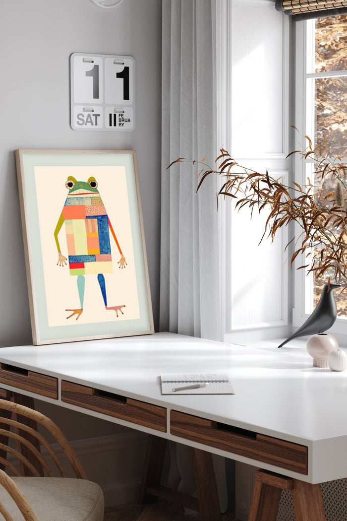 Colorful geometric frog poster in a modern home office setting