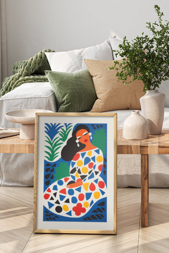 Modern abstract art poster featuring a stylized figure surrounded by colorful patterns in a cozy interior design