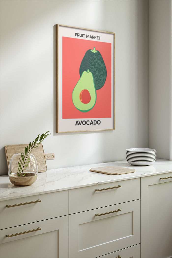 A modern kitchen with a framed poster advertisement displaying a Fruit Market Avocado artwork