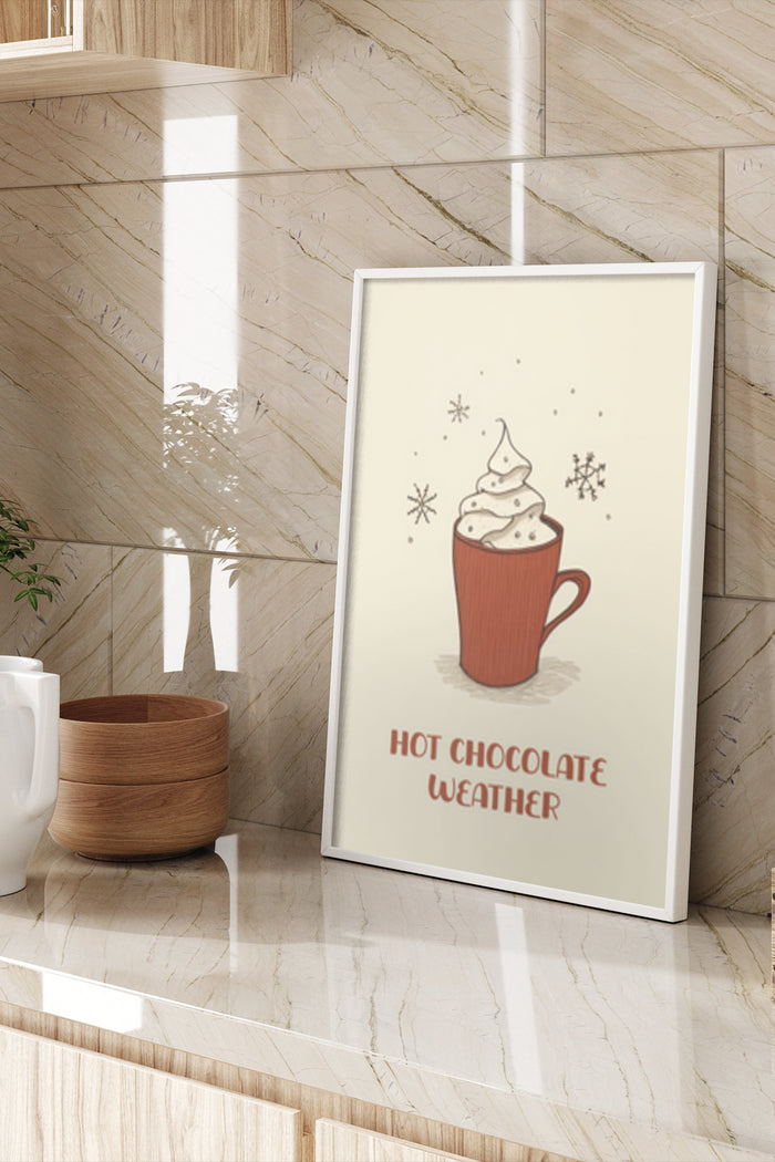 Art poster with a drawing of a mug of hot chocolate and the phrase 'Hot Chocolate Weather' displayed in an interior setting
