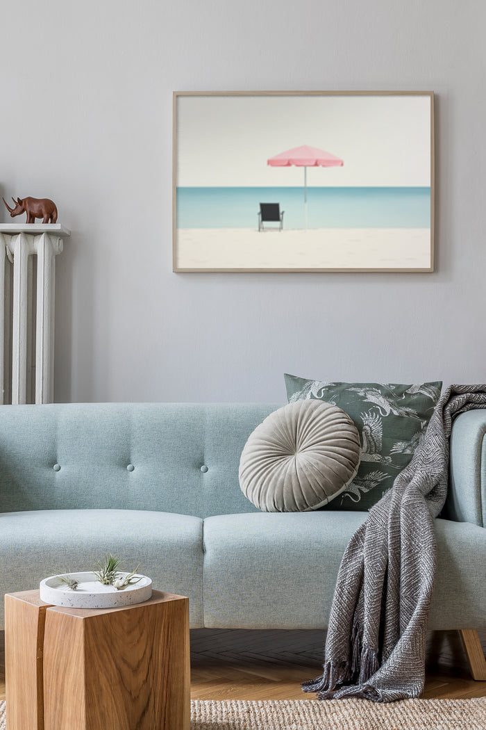 Minimalist art poster of a beach scene with pink umbrella and chair on a wall above sofa