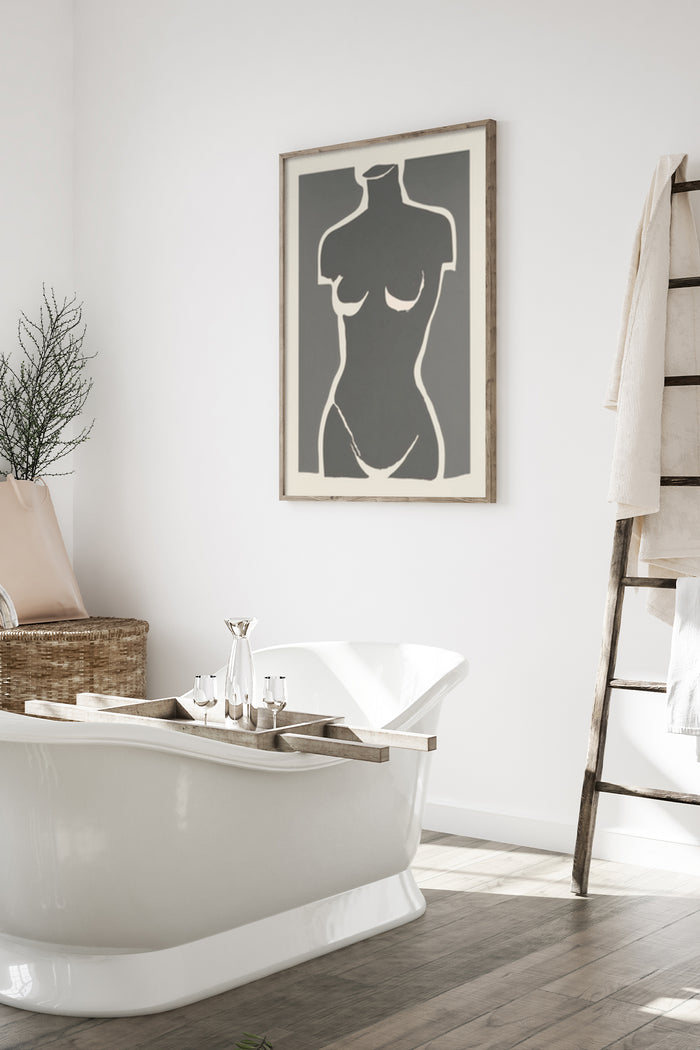 Minimalist female silhouette framed poster above a modern bathtub in a stylish bathroom setting