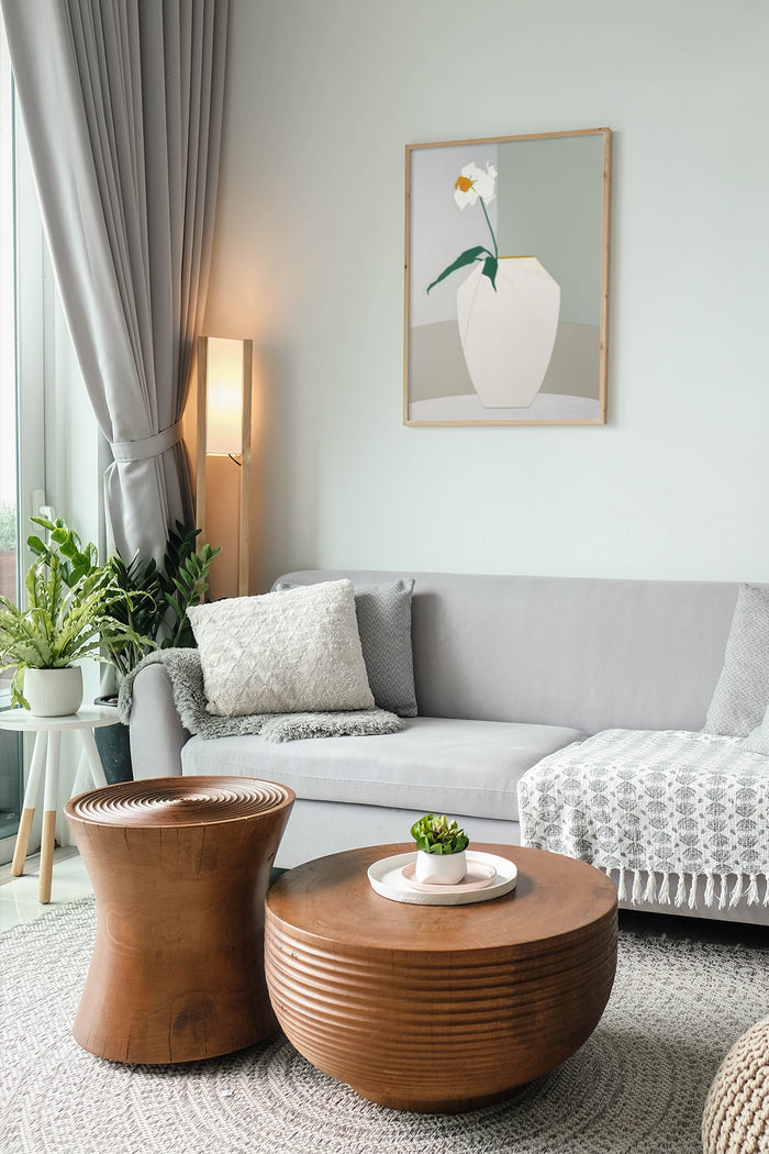 Minimalist flower in vase poster hanging in a modern living room interior