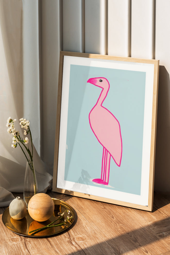 Contemporary minimalist pink flamingo art poster in a wooden frame with home decor