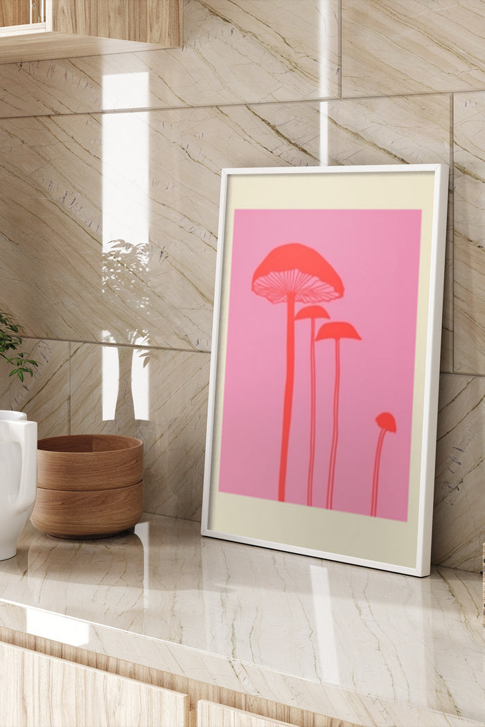 Contemporary red mushroom illustration poster on pink background displayed in a modern interior