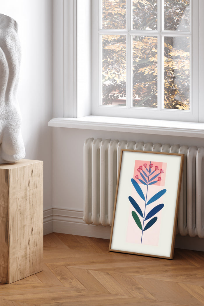 Stylish modern botanical poster with abstract plant design leaning against wall in a chic interior setting