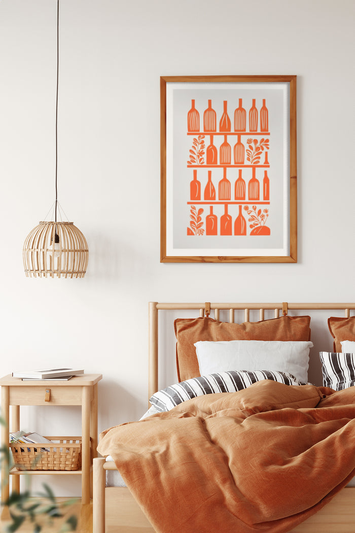 Stylish modern bedroom interior with burnt orange bedding and a framed poster featuring bottle and leaf patterns on the wall