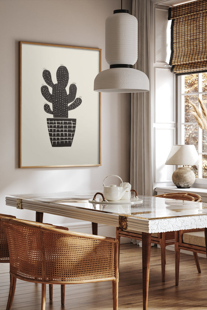 Contemporary black and white cactus print in wooden frame on dining room wall