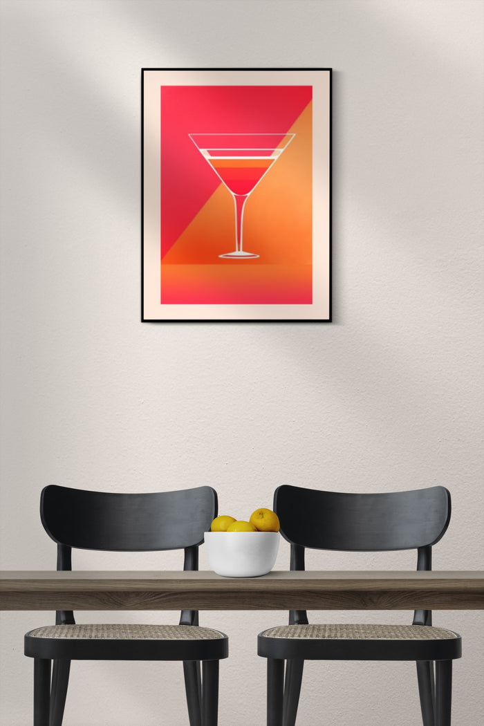 Minimalist modern cocktail glass poster artwork displayed above a table in a contemporary dining room setting