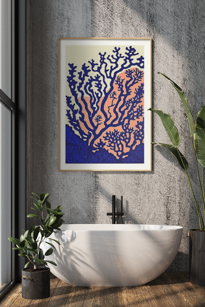 Contemporary coral reef design poster framed on a wall above a white bathtub in a stylish bathroom interior