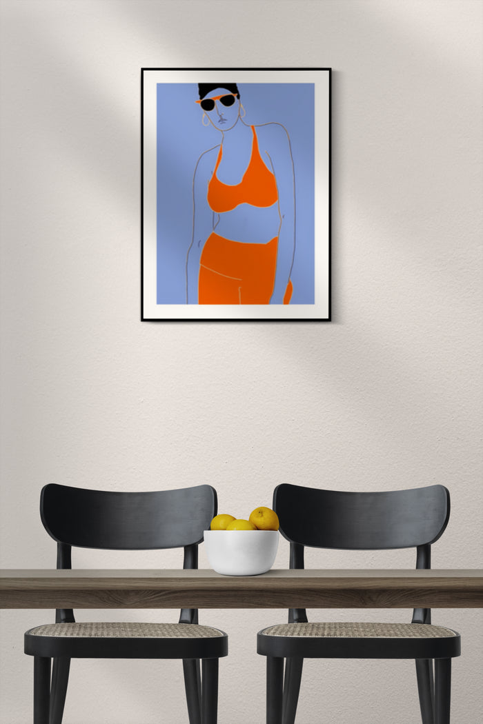 Modern fashion art poster of a woman in orange swimwear displayed on a wall