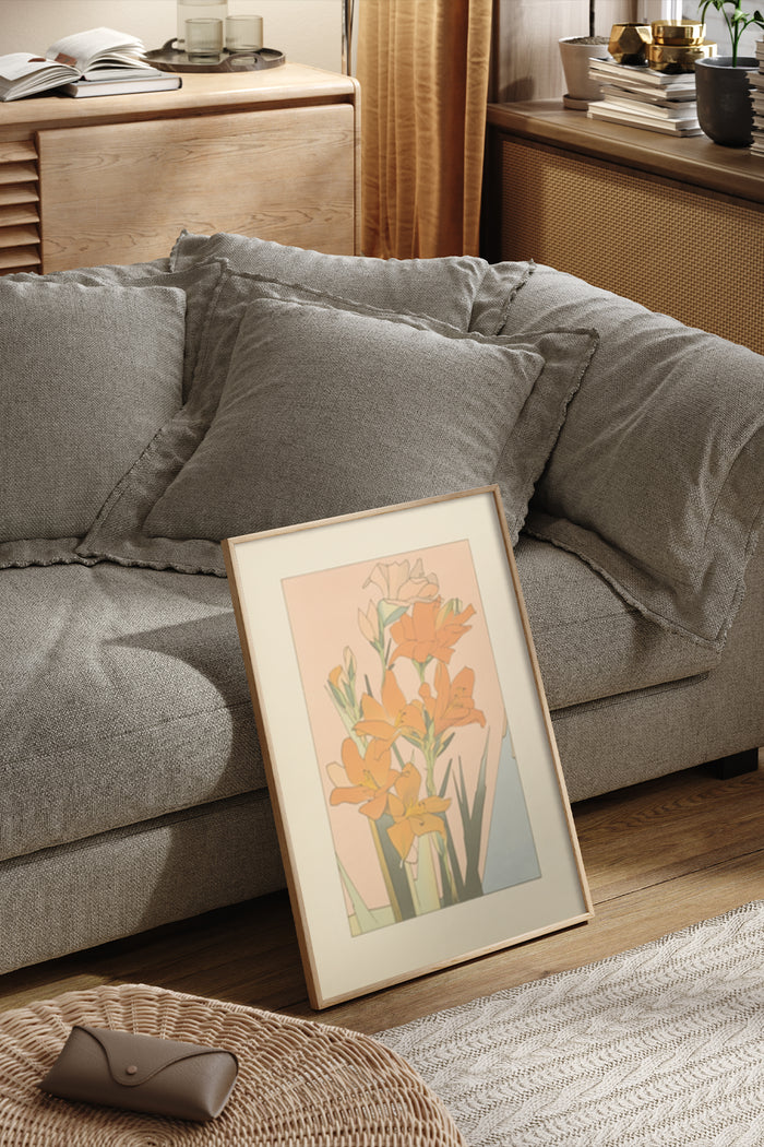 Stylish modern floral artwork with orange lilies in a poster frame, enhancing cozy living room ambiance