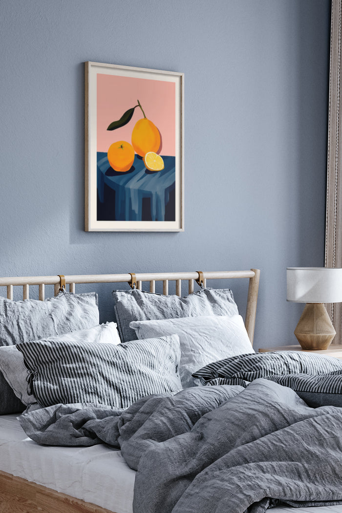 Modern fruit artwork poster with oranges and lemon on table displayed in a contemporary bedroom setting