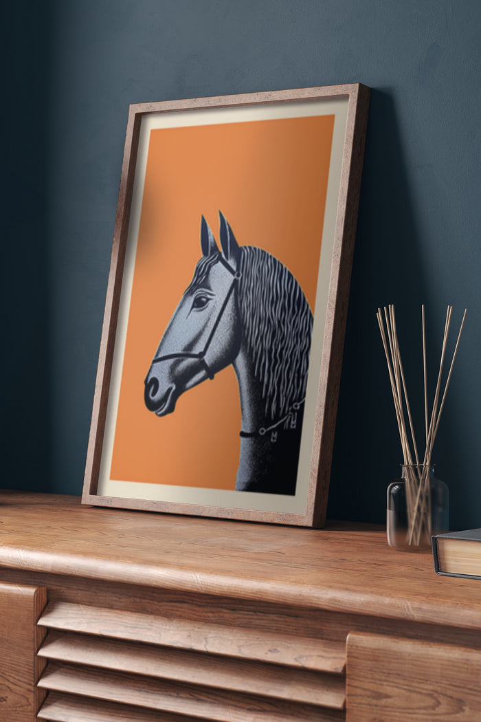 Contemporary horse illustration poster in wooden frame with orange background displayed on a desk