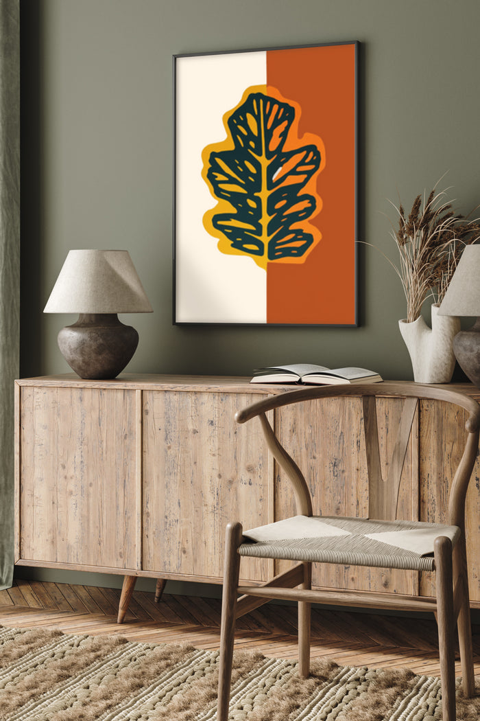 Contemporary leaf design poster framed on a living room wall with stylish wooden furniture and decor