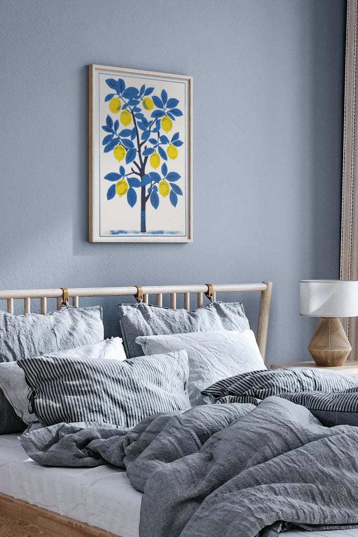 Framed art poster of a stylized lemon tree with blue leaves and yellow fruit displayed in a contemporary bedroom setting