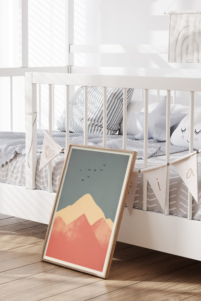 Stylish minimalist mountain artwork in a children's room setting with cozy bedding