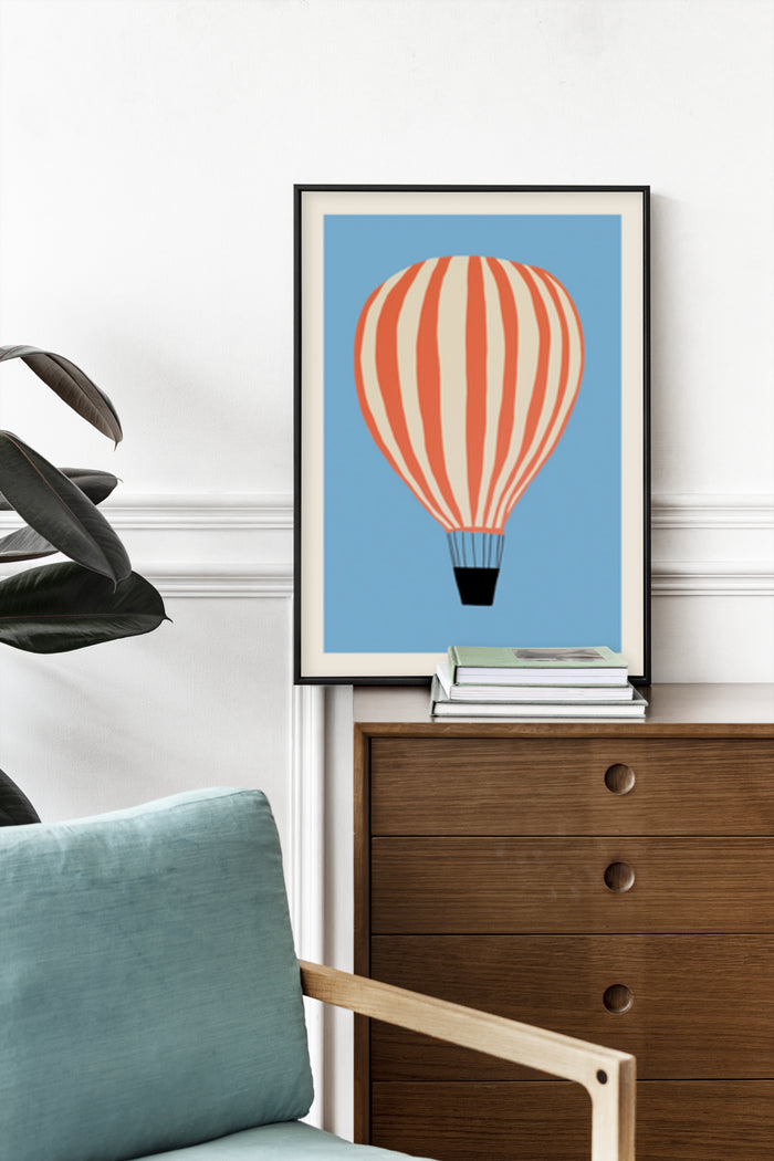 Minimalist orange striped hot air balloon poster art in a modern living room