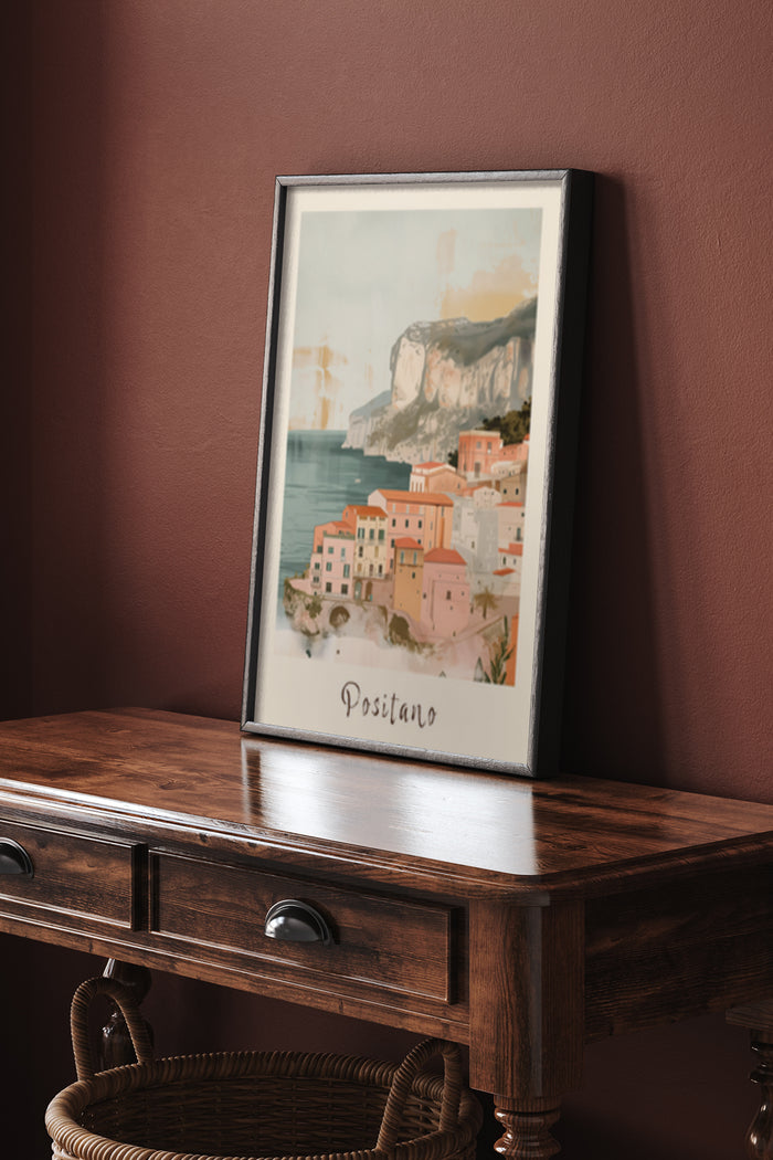 Vintage style Positano travel poster in a silver frame on wooden console table