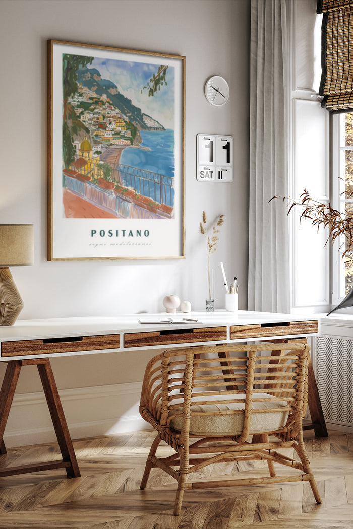 Positano travel poster depicting coastal village scene on wall in a stylish home office interior