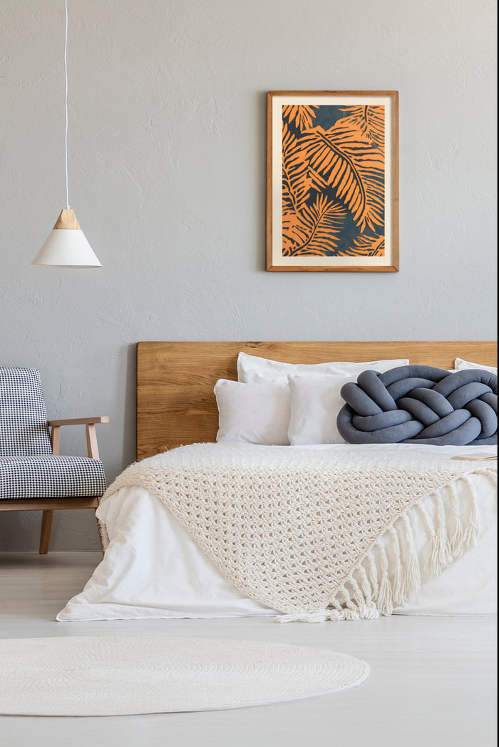 Modern bedroom interior featuring tropical leaf artwork with wooden bed frame and stylish pendant light