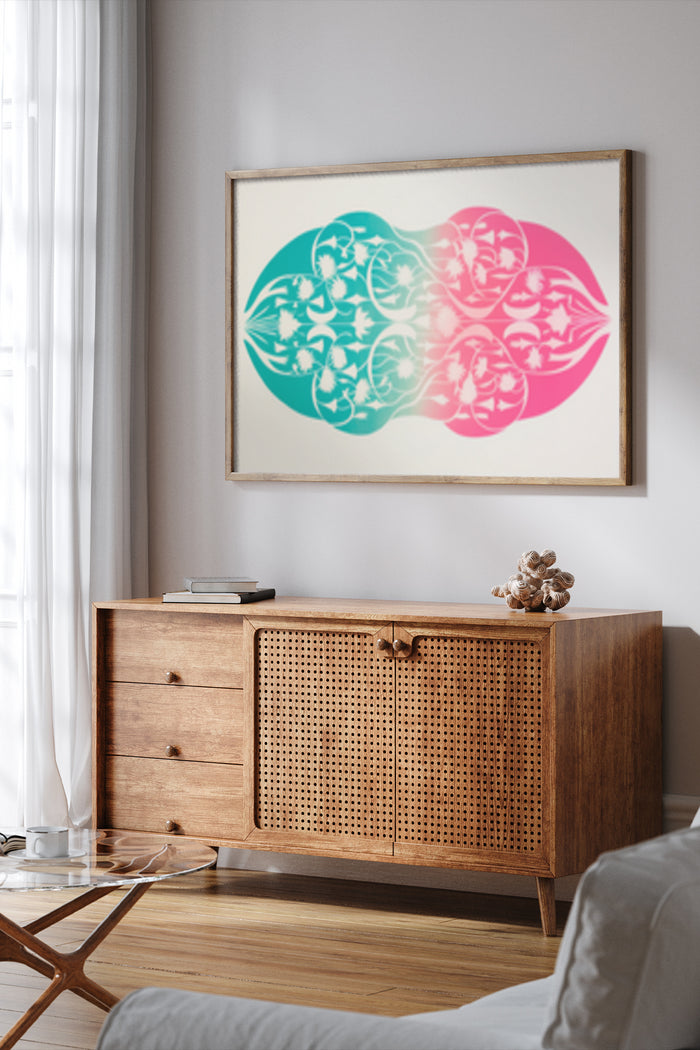 Abstract geometric artwork with vibrant pink and blue circles displayed above a wooden credenza in a contemporary room setting