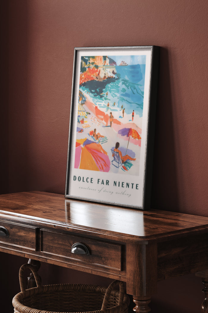 Vintage beach scene poster titled Dolce Far Niente displayed in a framed picture on a wooden console