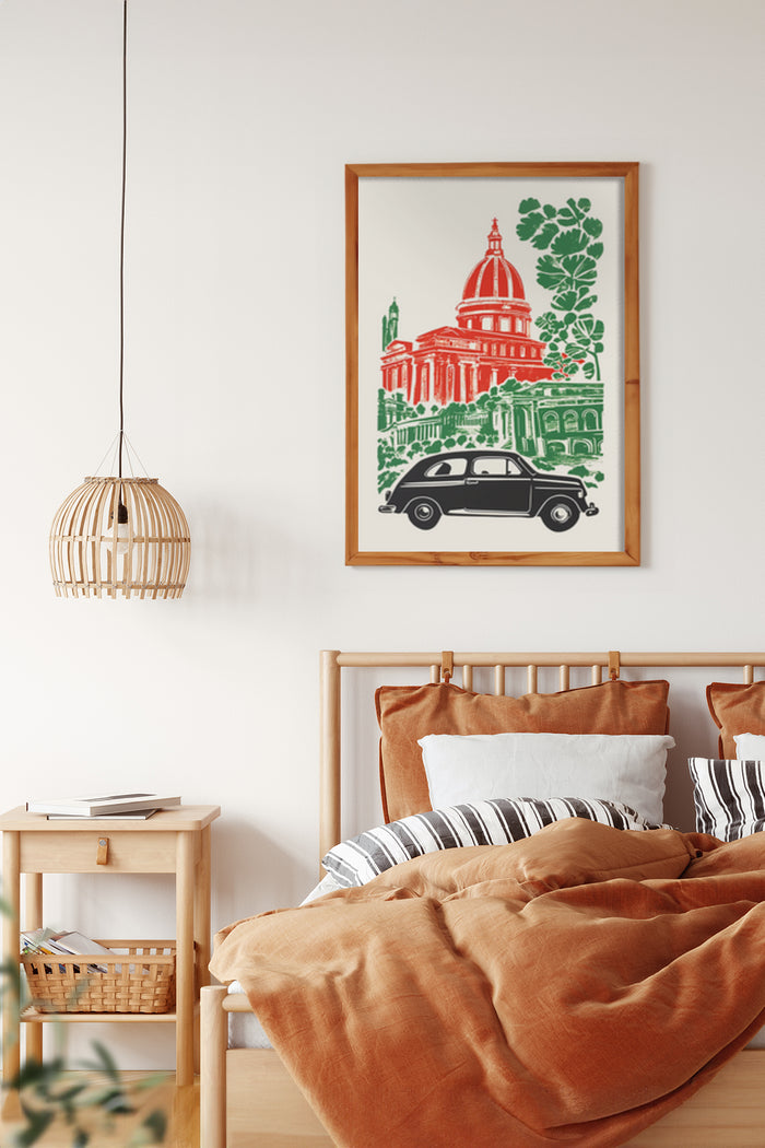 Vintage black car and green historic building illustration in a wooden frame above a bed with orange bedding