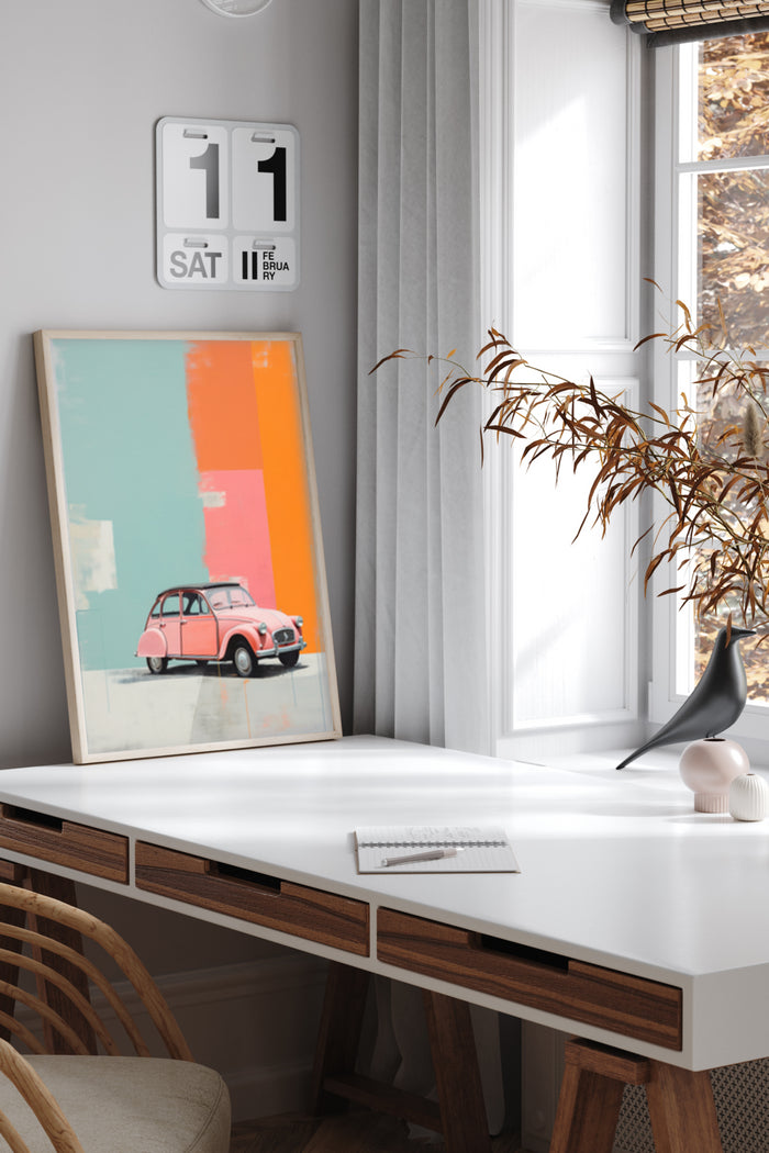Colorful vintage car poster in a modern home office setting with stylish desk and decor