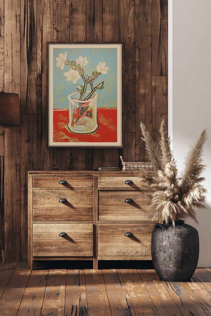 Vintage floral artwork in a glass vase featured in a rustic wooden frame on a wooden sideboard for interior decoration