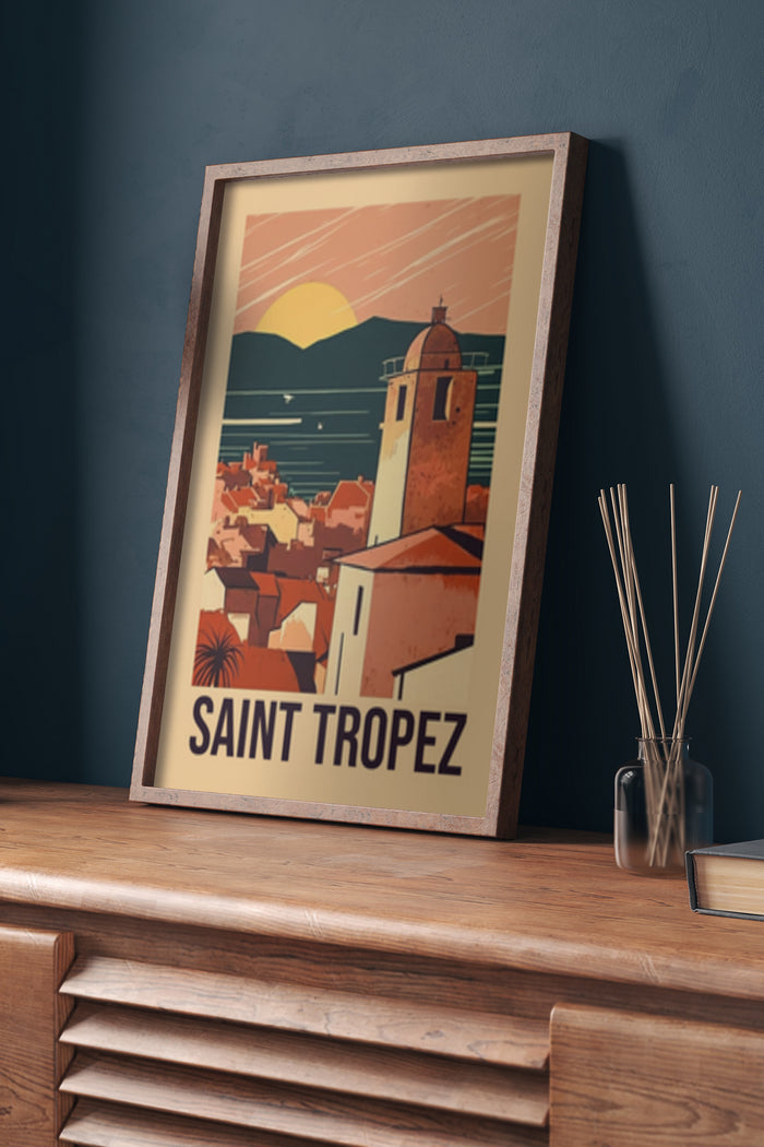 Vintage travel poster of Saint Tropez with sun setting over Mediterranean village