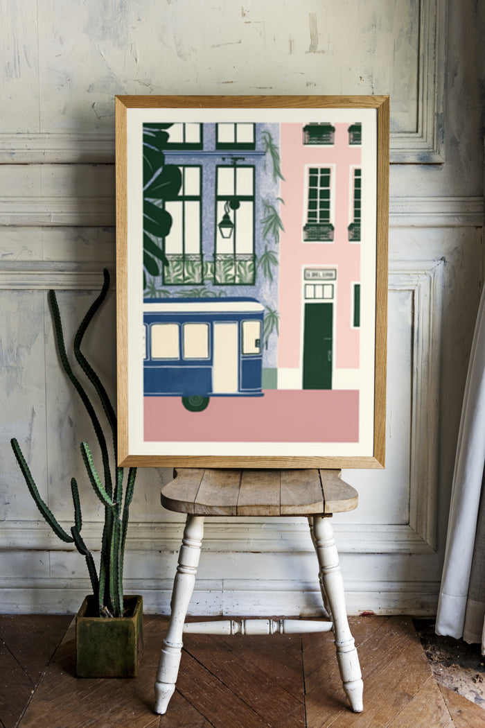 Vintage style illustration poster of a tram and colorful buildings in a frame on a wooden table