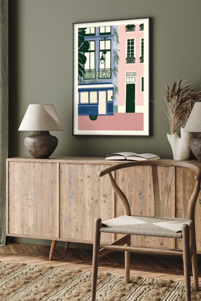 Whimsical cityscape poster with vintage tram and pink building framed on living room wall