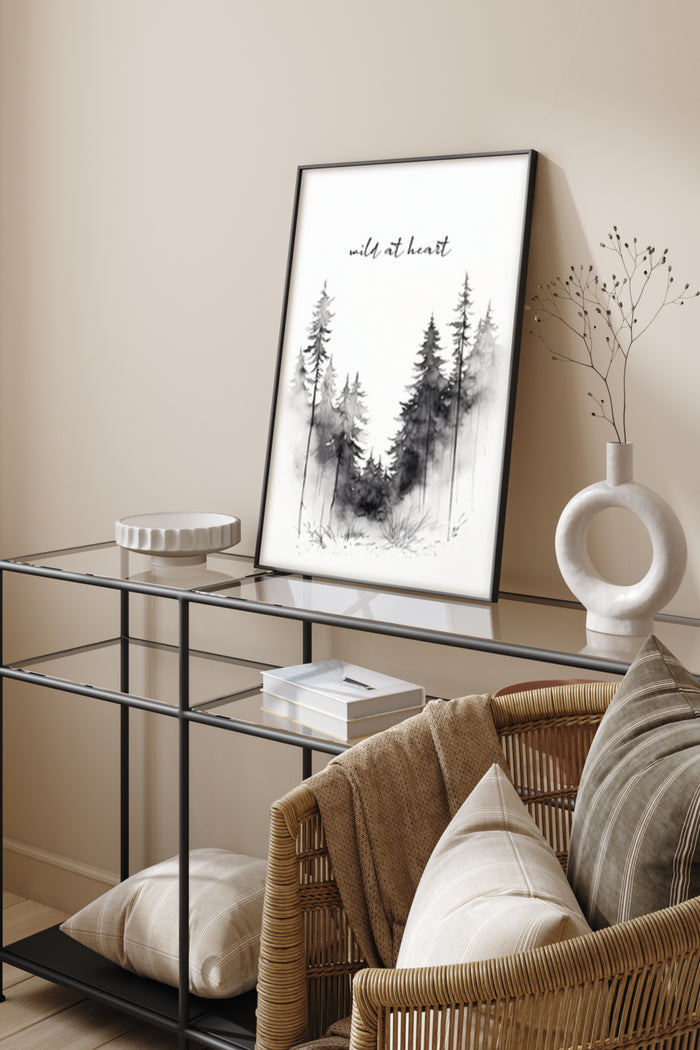 Black and white 'Wild at Heart' forest sketch poster in modern home interior