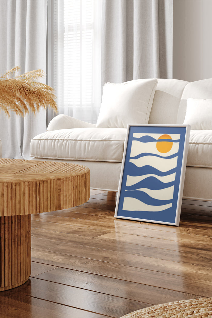 Abstract beach waves artwork poster with sun on display in a cozy modern living room interior