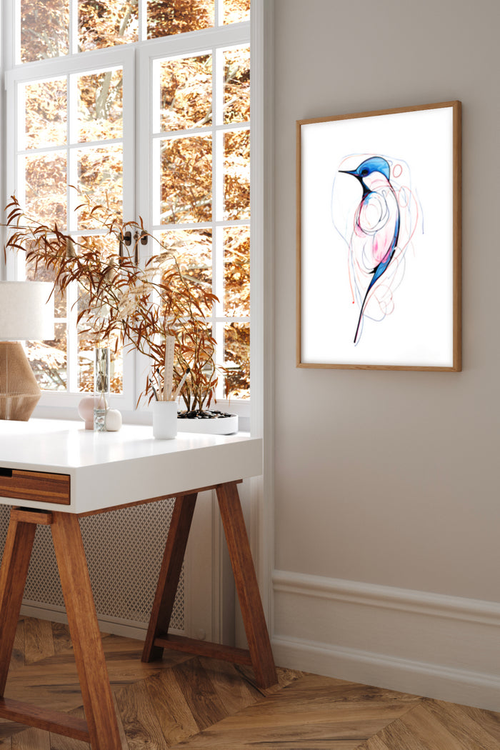 Modern abstract bird artwork poster framed on the wall of a stylish room with autumn scenery outside the window