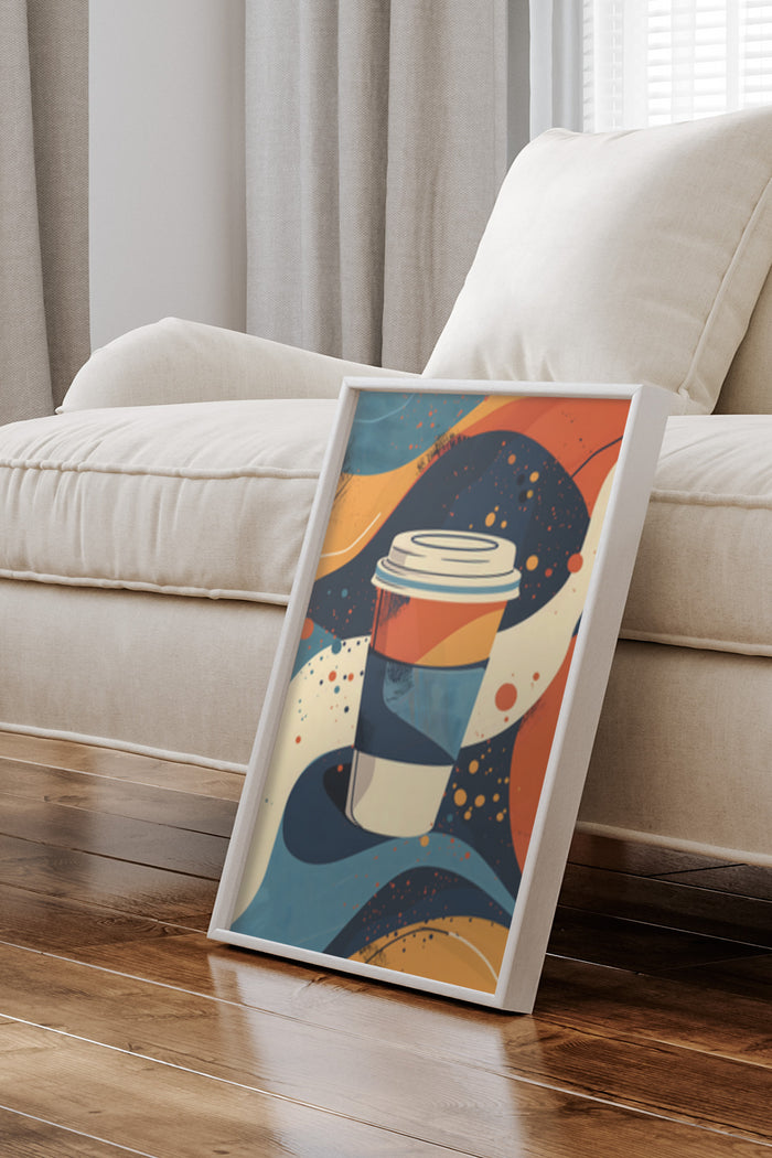 Abstract art poster of a stylized coffee cup on display in a cozy home setting
