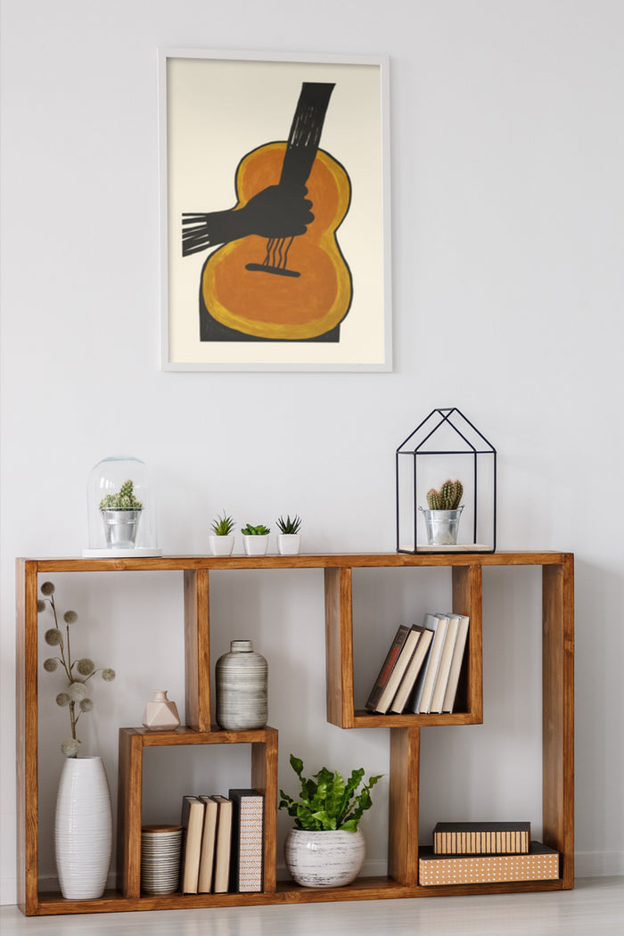 Abstract guitar painting with hand on canvas, displayed in contemporary home decor