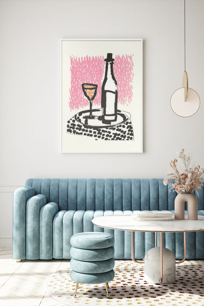 Abstract art poster of wine bottle and glass with pink brushstrokes on wall above blue tufted sofa