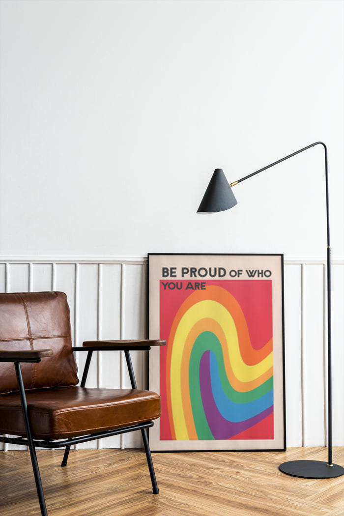 Inspirational rainbow poster with the phrase 'Be Proud of Who You Are' in a stylish room