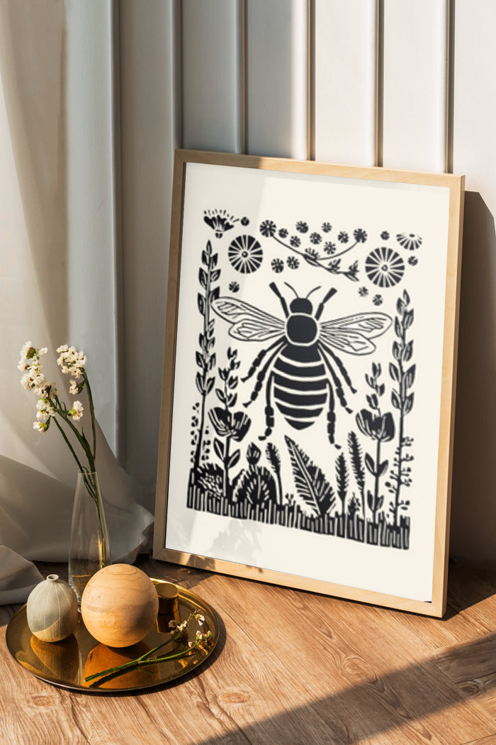 Monochrome bee and flowers silhouette illustration in a frame