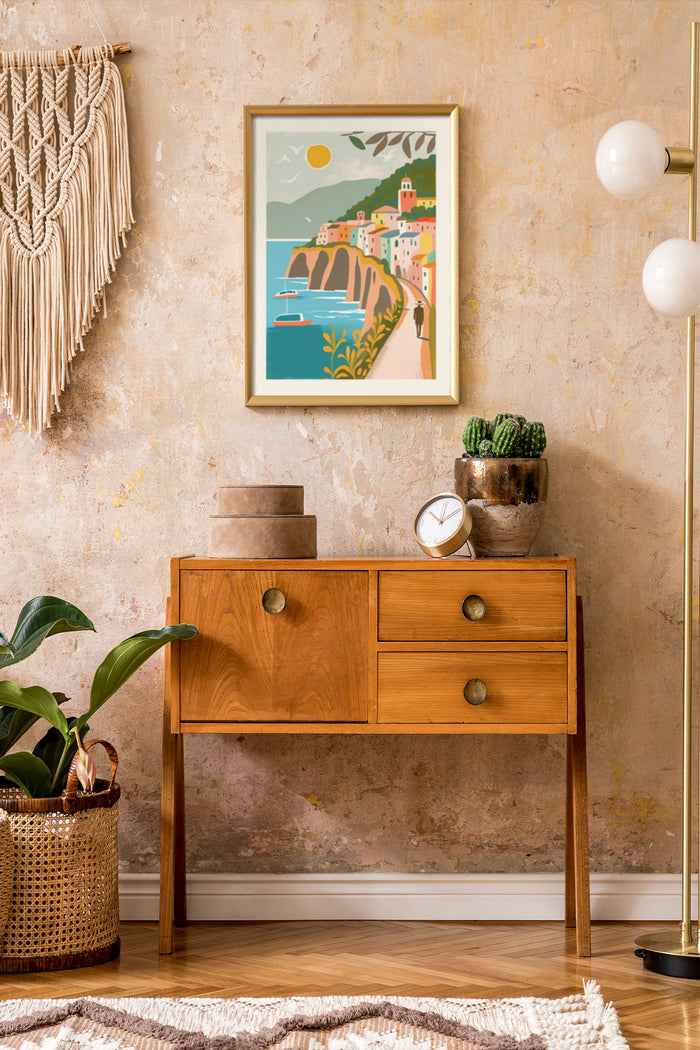 Retro style framed poster of a coastal village on a wooden sideboard in a stylish home interior