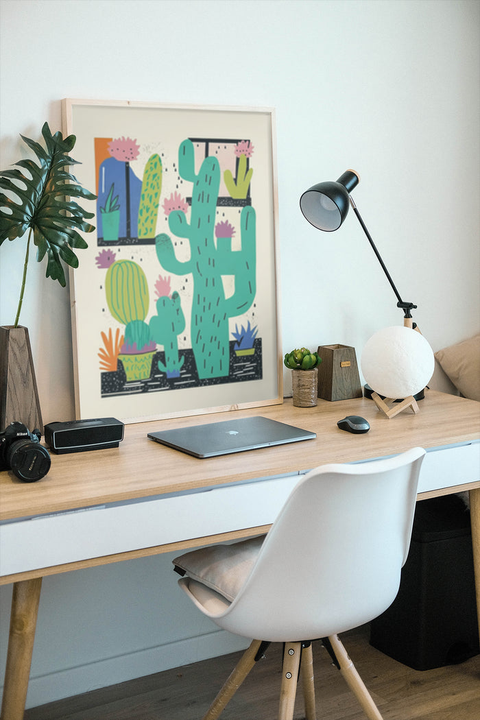 Modern home office featuring a colorful illustrated cactus poster on the wall
